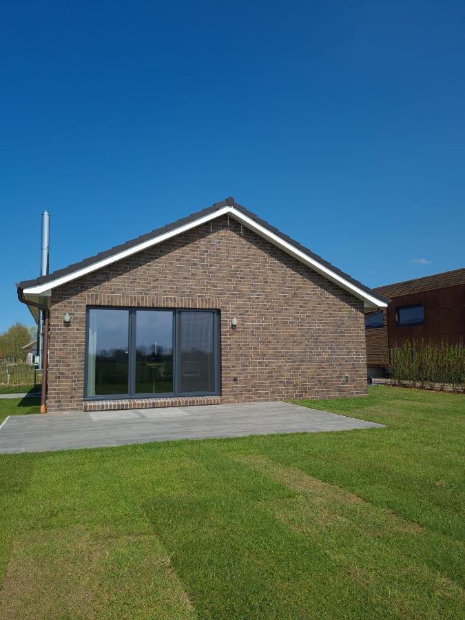Watt´n Blick - Hundefreundliches Ferienhaus mit Ausblick über die Wiesen bis zum Deich Schweiburg Exterior foto