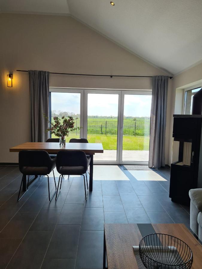 Watt´n Blick - Hundefreundliches Ferienhaus mit Ausblick über die Wiesen bis zum Deich Schweiburg Exterior foto